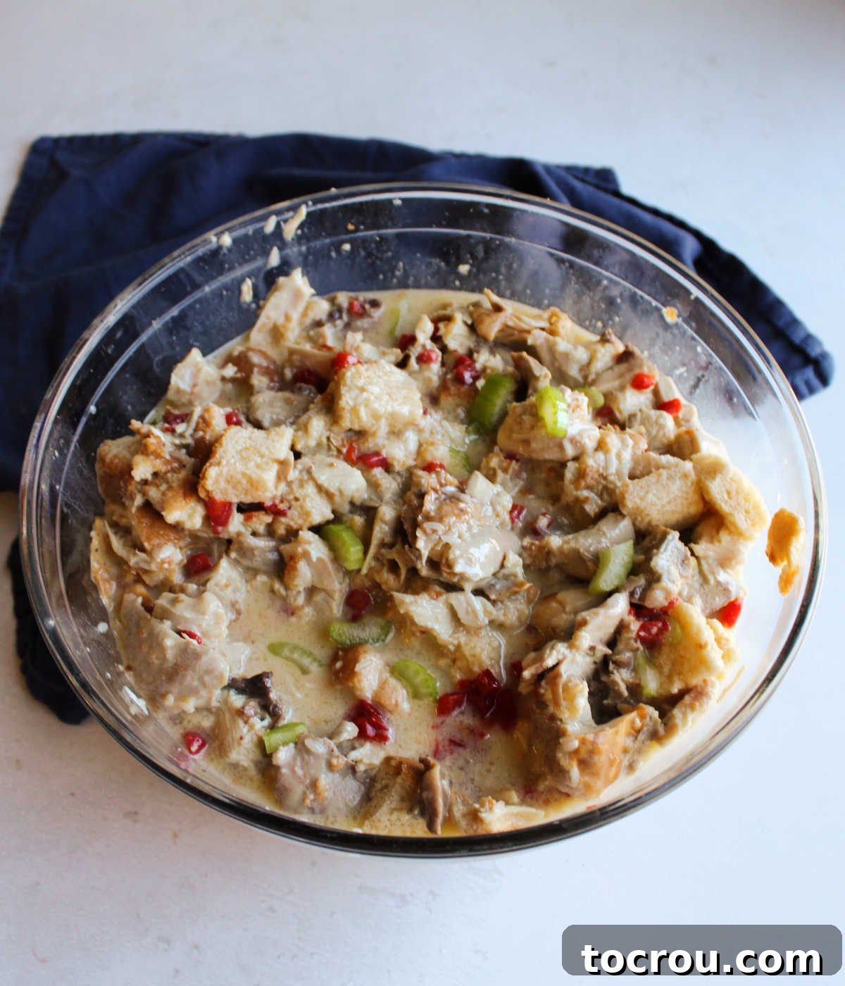 Comforting Turkey and Rice Casserole with Rich Gravy 3 Close-up of a large mixing bowl filled with the combined turkey casserole mixture, ready for baking.