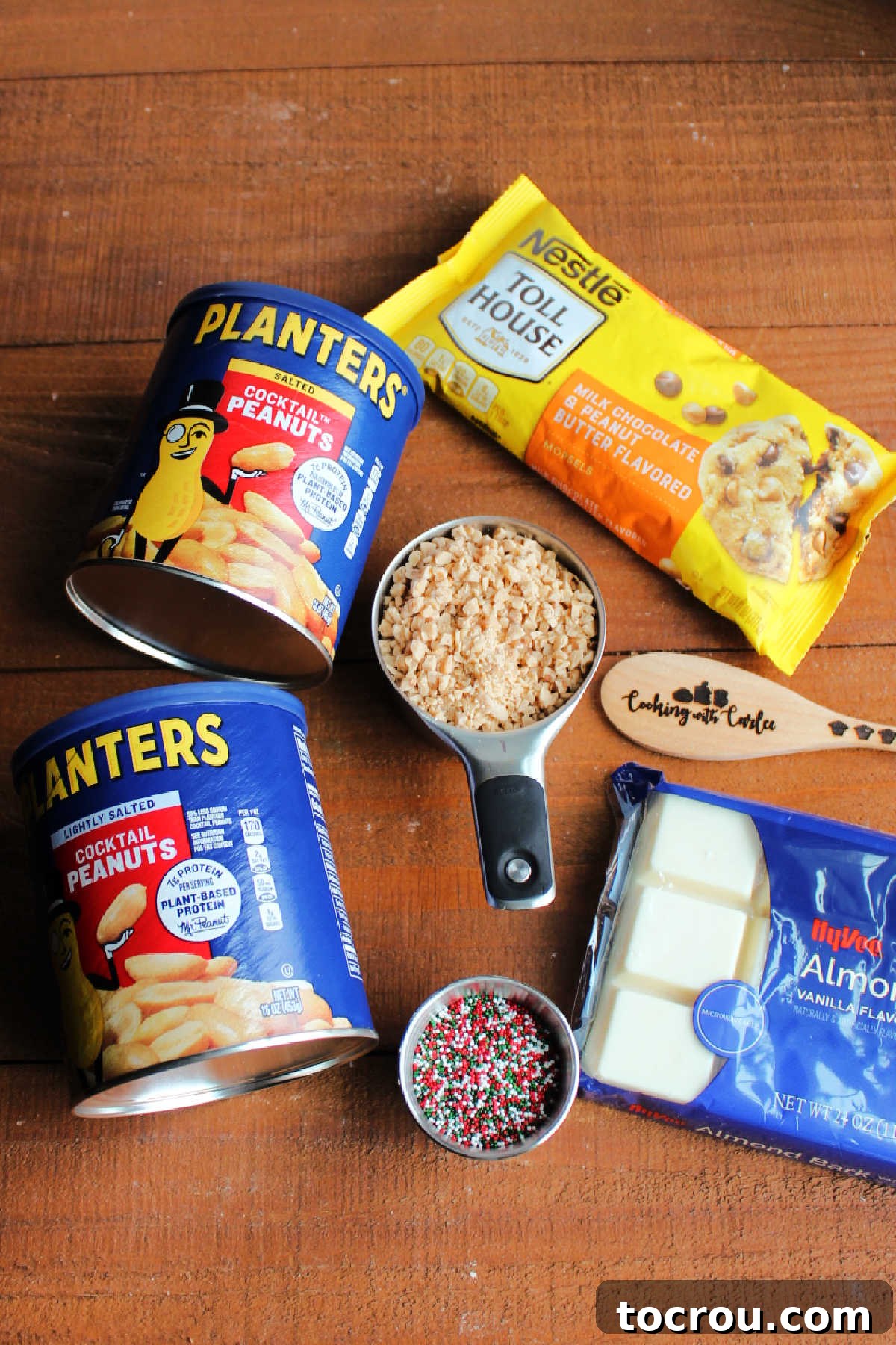 Effortless Crockpot Peanut Delights 3 Ingredients including peanuts, chocolate chips, peanut butter chips, almond bark and toffee bits ready to be made into peanut clusters.