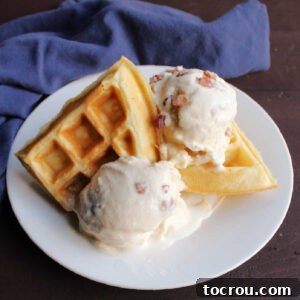 Maple Bacon Bliss Ice Cream 9 Plate of waffles with a couple of scoops of maple bacon ice cream.