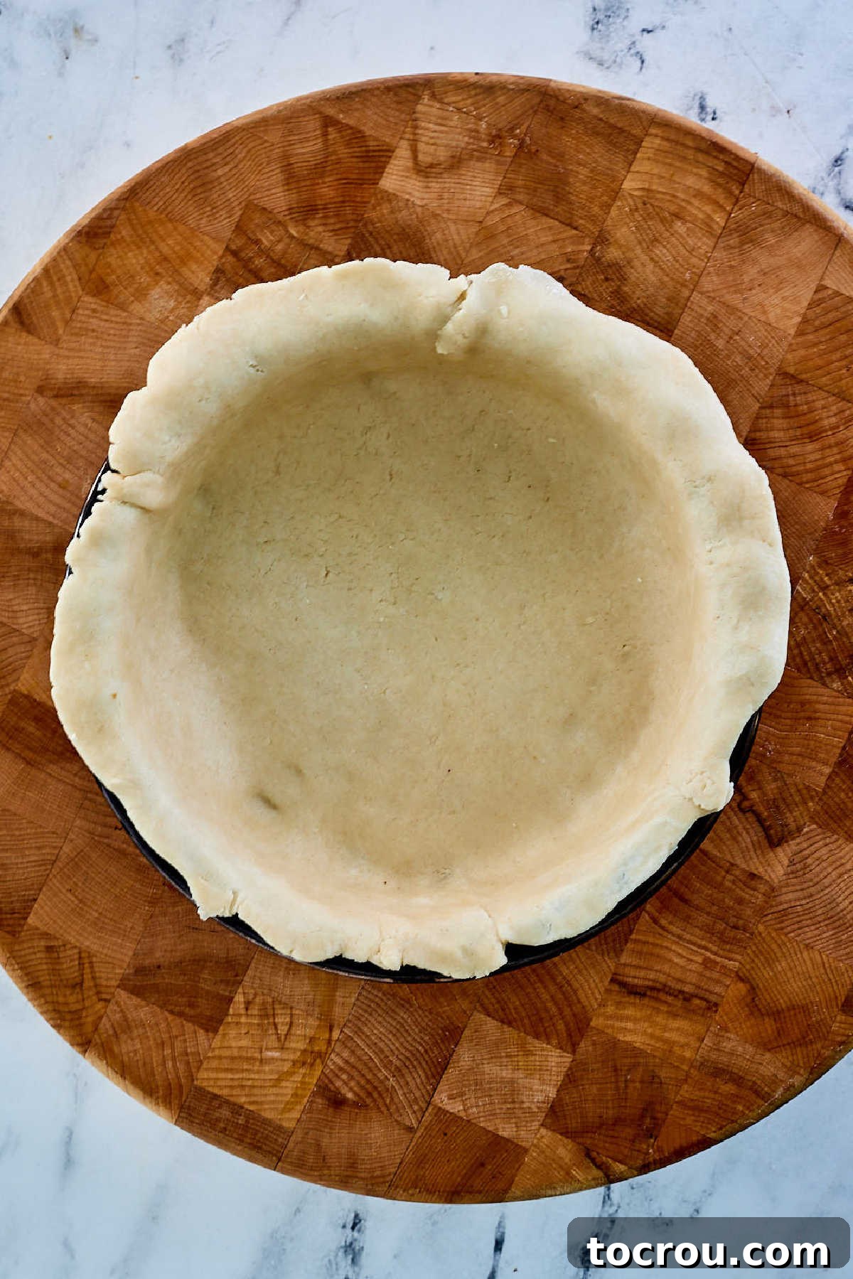 Pure Honey and Maple Pecan Pie 6 Lard pie crust in pie pan ready for filling.