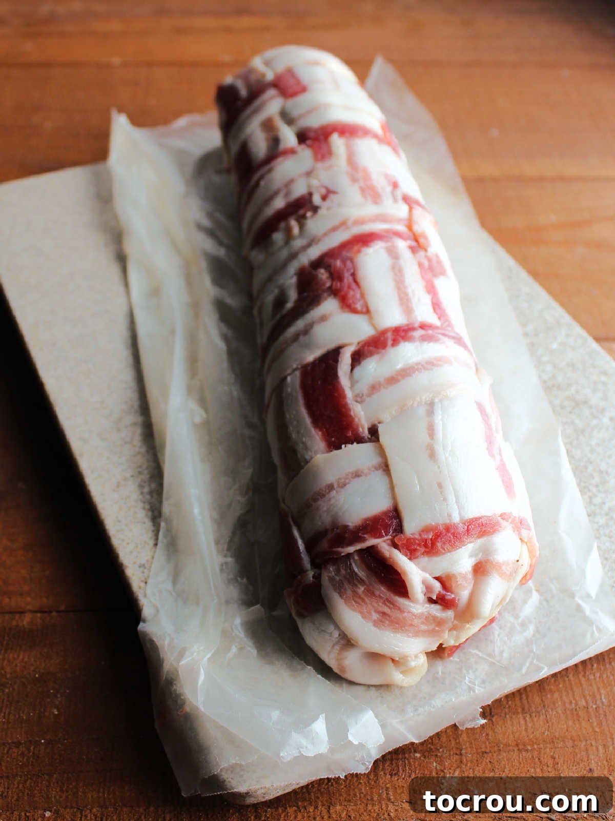 Bacon fatty wrapped in bacon weave, ready to be put on the smoker.