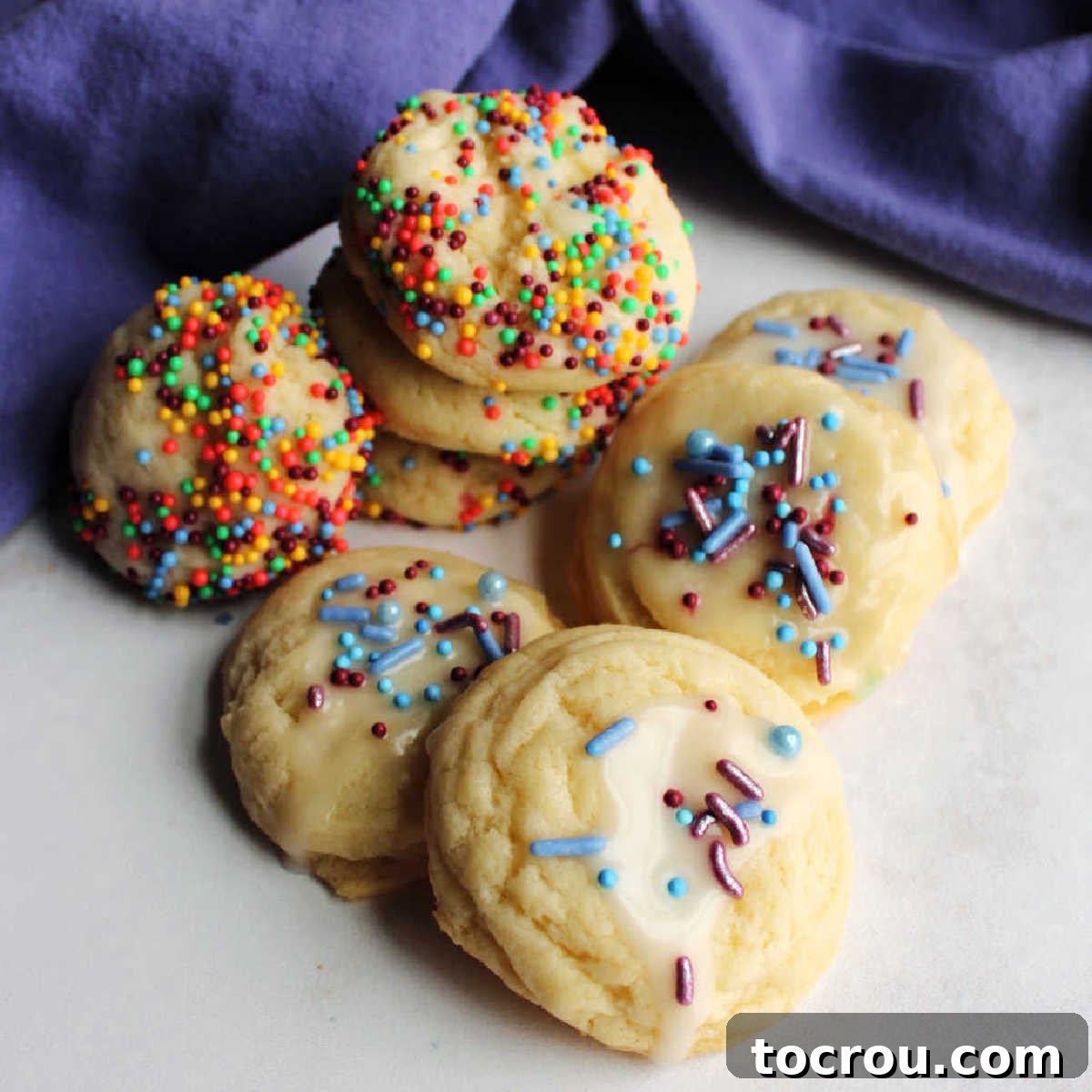 pile of soft sweetened condensed milk cookies with sprinkles.