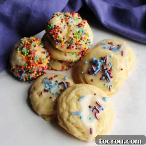 pile of soft sweetened condensed milk cookies with sprinkles.