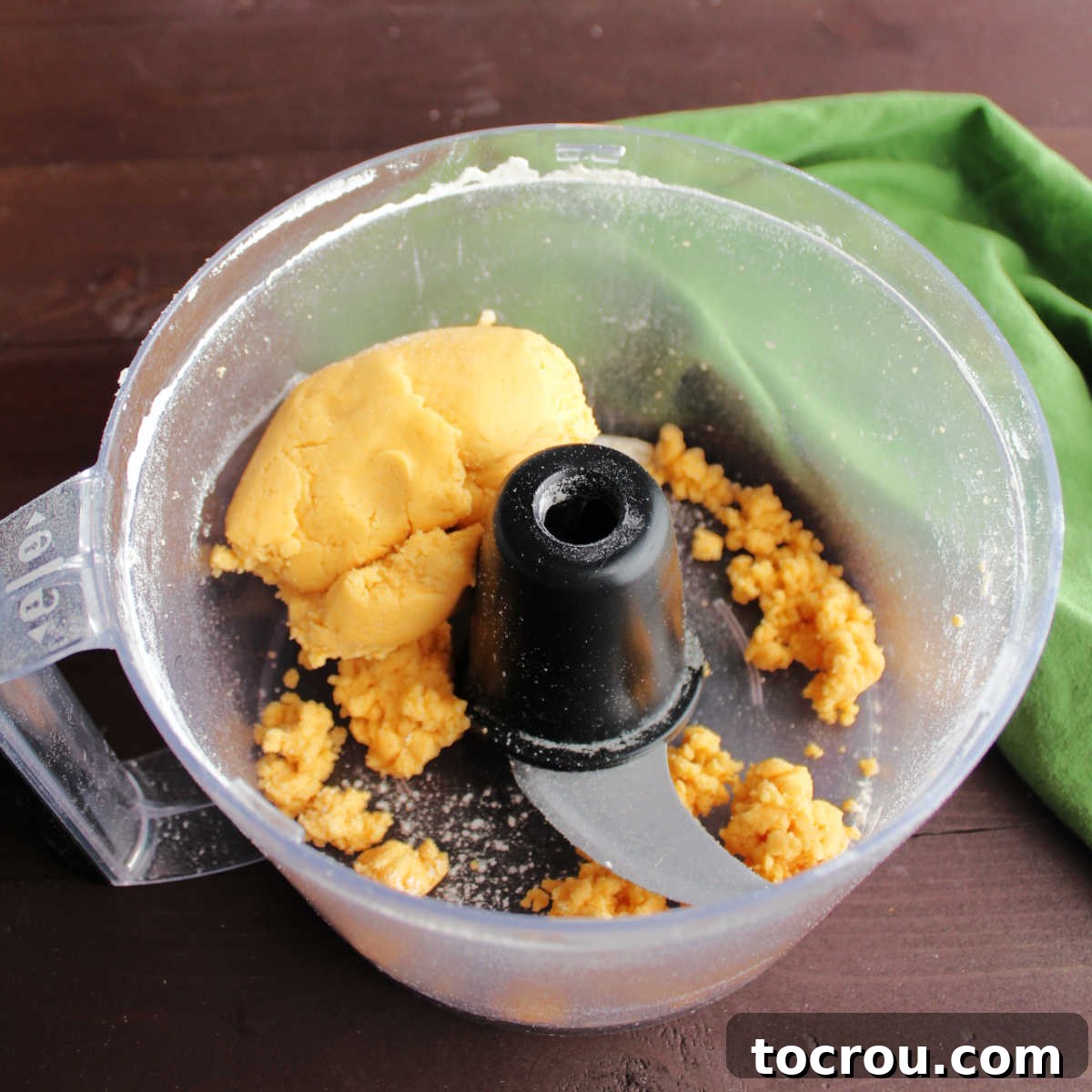 Cheese cracker dough in food processor.